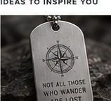 Concept: compass and quote engraved on dog tag