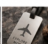 Concept: airplane artwork engraved on luggage tag